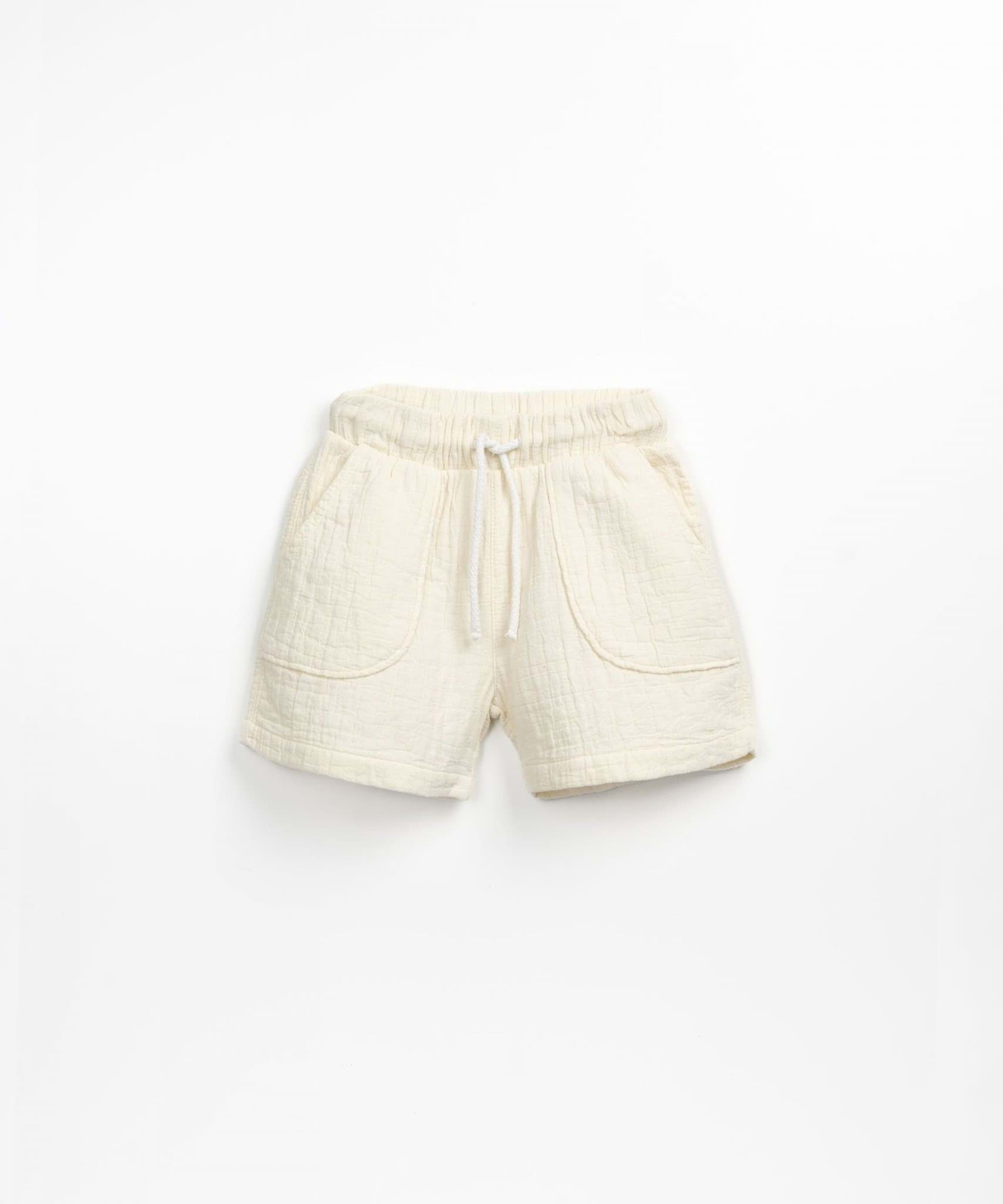 صورة Woven shorts with pockets - Off White
